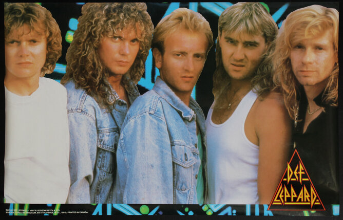 a group of men posing for a photo