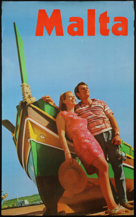 a man and woman standing next to a boat