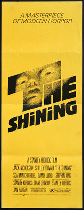 a yellow poster with a face and text