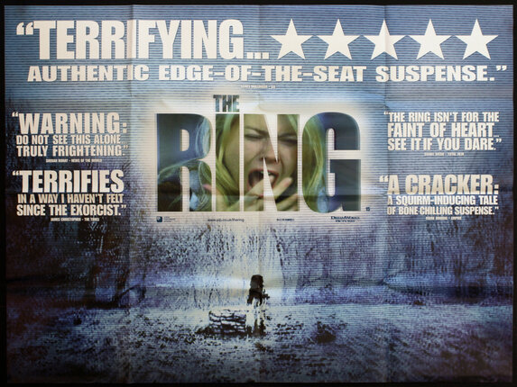 a movie poster with a man in the middle of a snowy forest