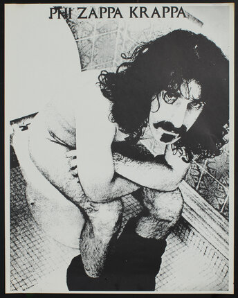 a man sitting on a toilet