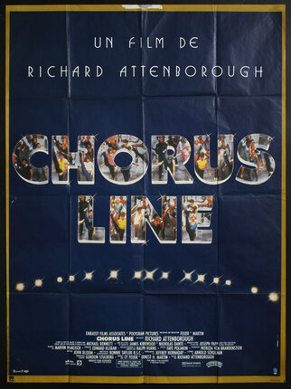 Movie poster with dark blue background and images of dancers filling in the text that spells out the title: Chorus Line.