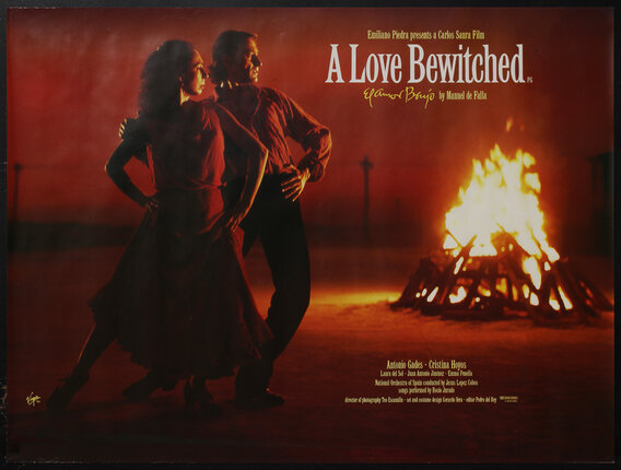 a movie poster with a man and woman flamenco dancers in front of a bonfire