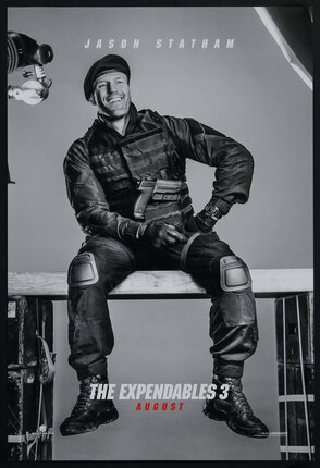 movie poster with Jason Statham dressed as a commando sitting on some kind of wood bench