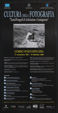 poster with lots of type and a small black and white photograph of people walking up a dirt road. A woman leads holding a bundle in white cloth. A woman with a black umbrella walks next to her.