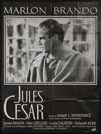 a movie poster with a black and white photo of a man (Marlon Brando) in Ancient Roman attire turned in profile