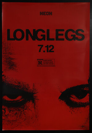 movie poster with eyes and black text on red background