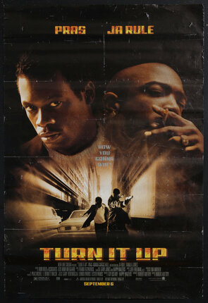 movie poster with two men, one is smoking a cigarette. below is an smaller image of two men in a street pointing guns