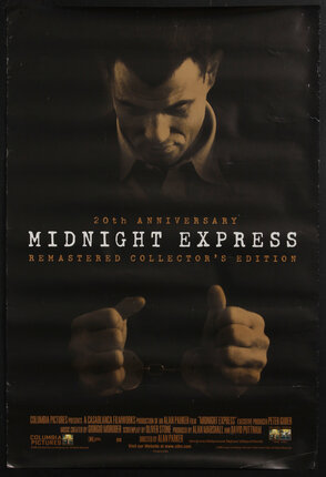 a movie poster of a man in handcuffs