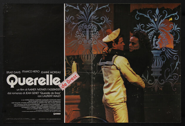 movie poster with a man in a sailor costume and a woman embraced in a dance