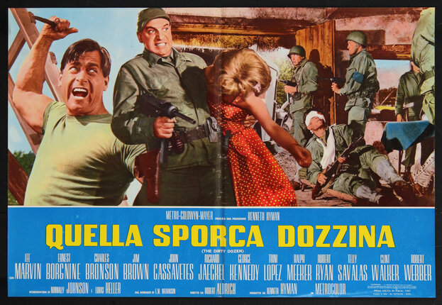 a movie poster with a man weilding a dagger and a solider pointing an automatic rifle and  holding and unconscious woman.