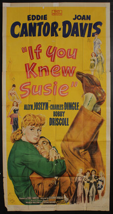 a movie poster with a man with his legs in the air sitting in a woman's lap 
