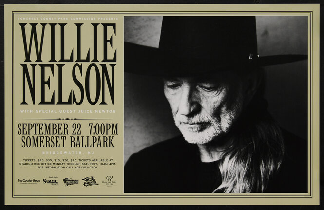 poster with a man wearing a hat