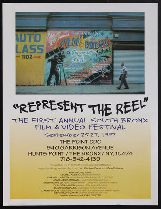 poster with a man walking by a film festival mural painted on a brick wall