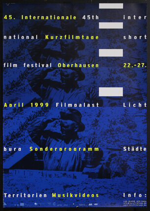 poster with a man coming out of a trap door in the ground