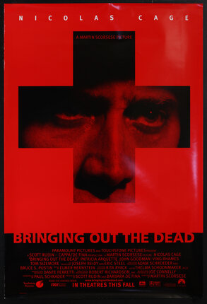 movie poster a face looking through a cross