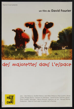 movie poster with blurry cows