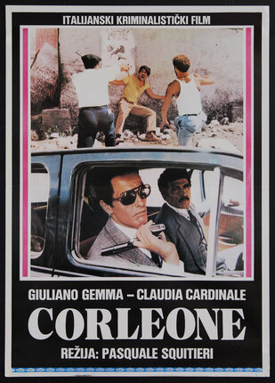 movie poster with two men in a car one has a gun. in the background a man is attacked against a wall