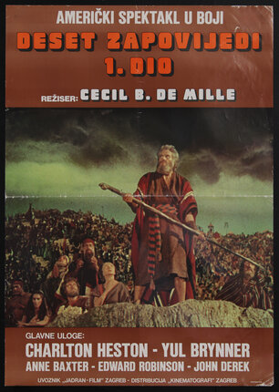 a poster of a man holding a staff with a crowd of follows behind him