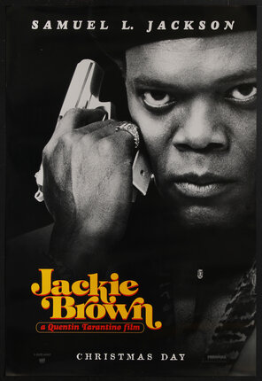 a movie poster with Samuel L. Jackson holding a gun near his face