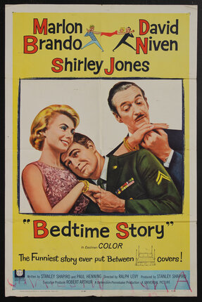 a movie poster of a man and a woman and another man