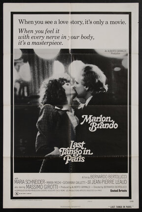 a movie poster of a woman and man kissing