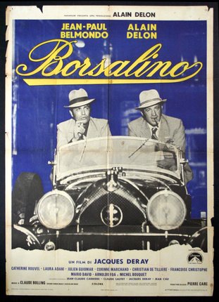 a poster of two men in a car