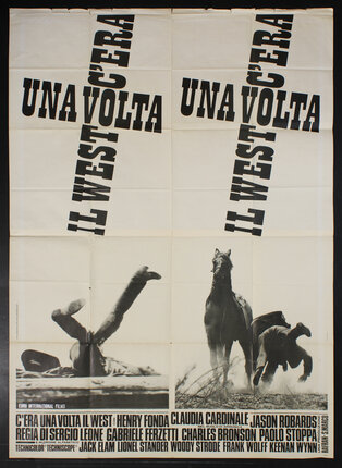 a poster with a horse and a man lying on the ground