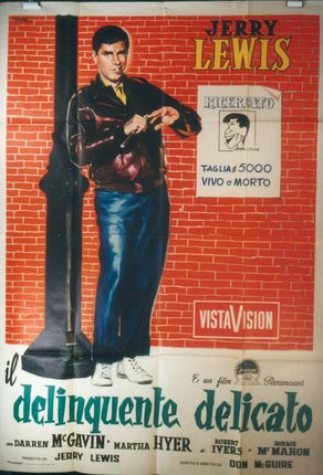 a poster of a man standing next to a pole