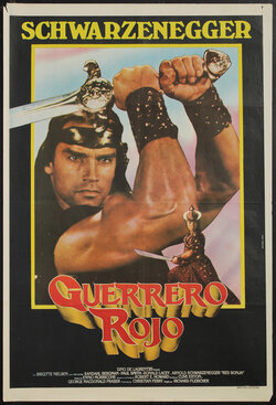 movie poster with actor Arnold Schwarzenegger in fantasy pseudo-historical costume flexing his biceps while holding a sword over his head