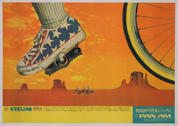 poster with a detailed view of a sneakered foot on a bicycle pedal with a wheel, with more cyclists in the distance and a vast dessert plain with mesas.