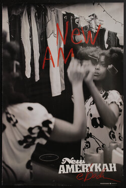 a woman looking in the mirror writing on the surface with lipstick