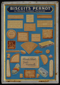 a metal sign with images of cookies