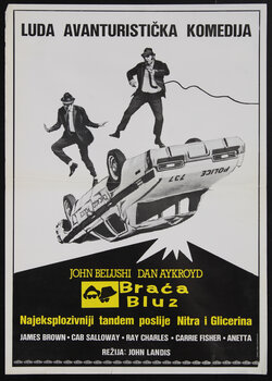 movie poster with two men in black suits jumping on a flipped over police car