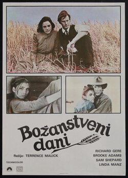 movie poster with a man and woman sitting in a field