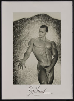 poster with a nude man in a water spray